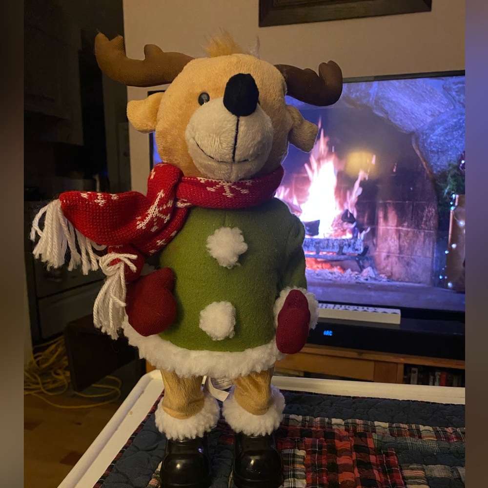 Festive dancing Reindeer Plush with Green Sweater and Red Scarf
